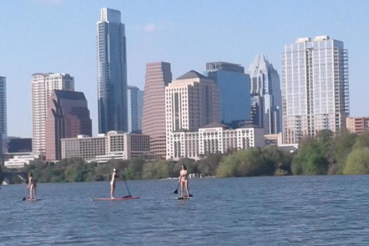 a group of people in a large body of water