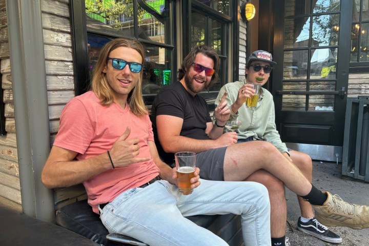a man and a woman sitting on a bench